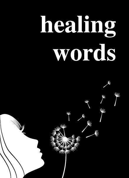 Hands holding paper with poetry for grief and healing